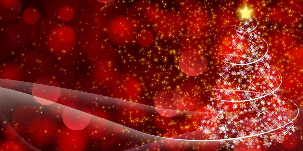 Leuchtender Weihnachtsbaum mit funkelnden Sternen | Geschenkkorb Weihnachten